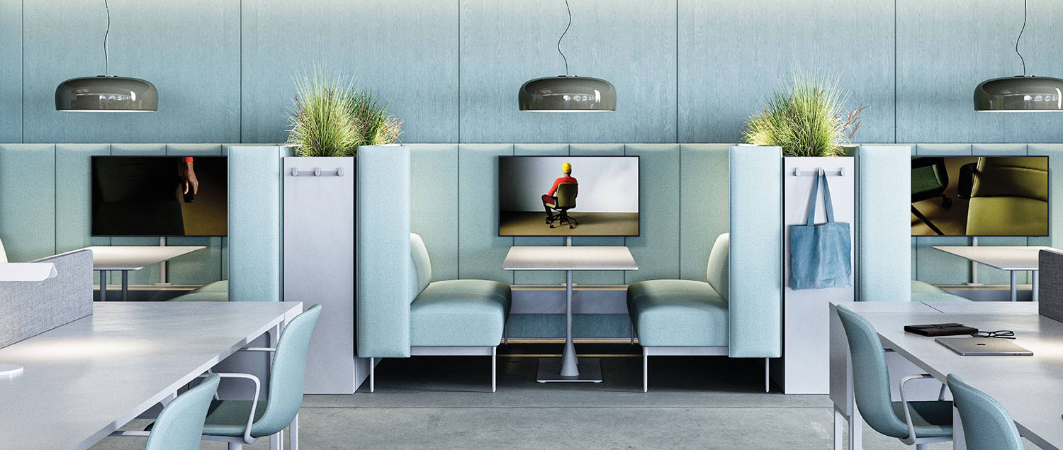 A room with a bunch of desks and a television.