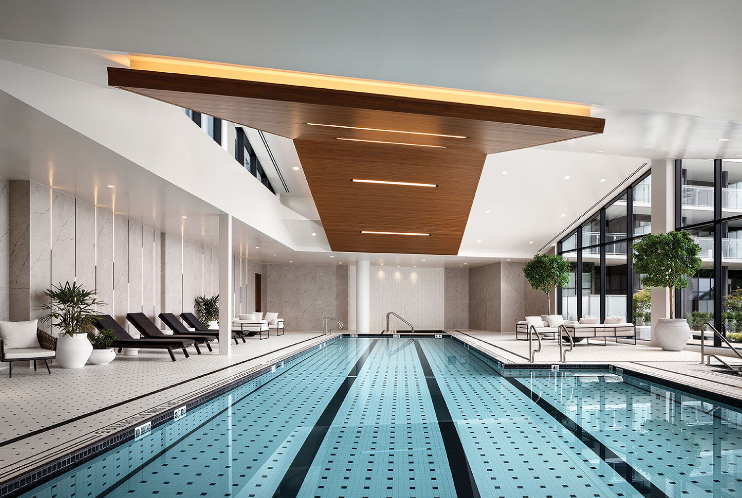 A swimming pool with a large skylight above it