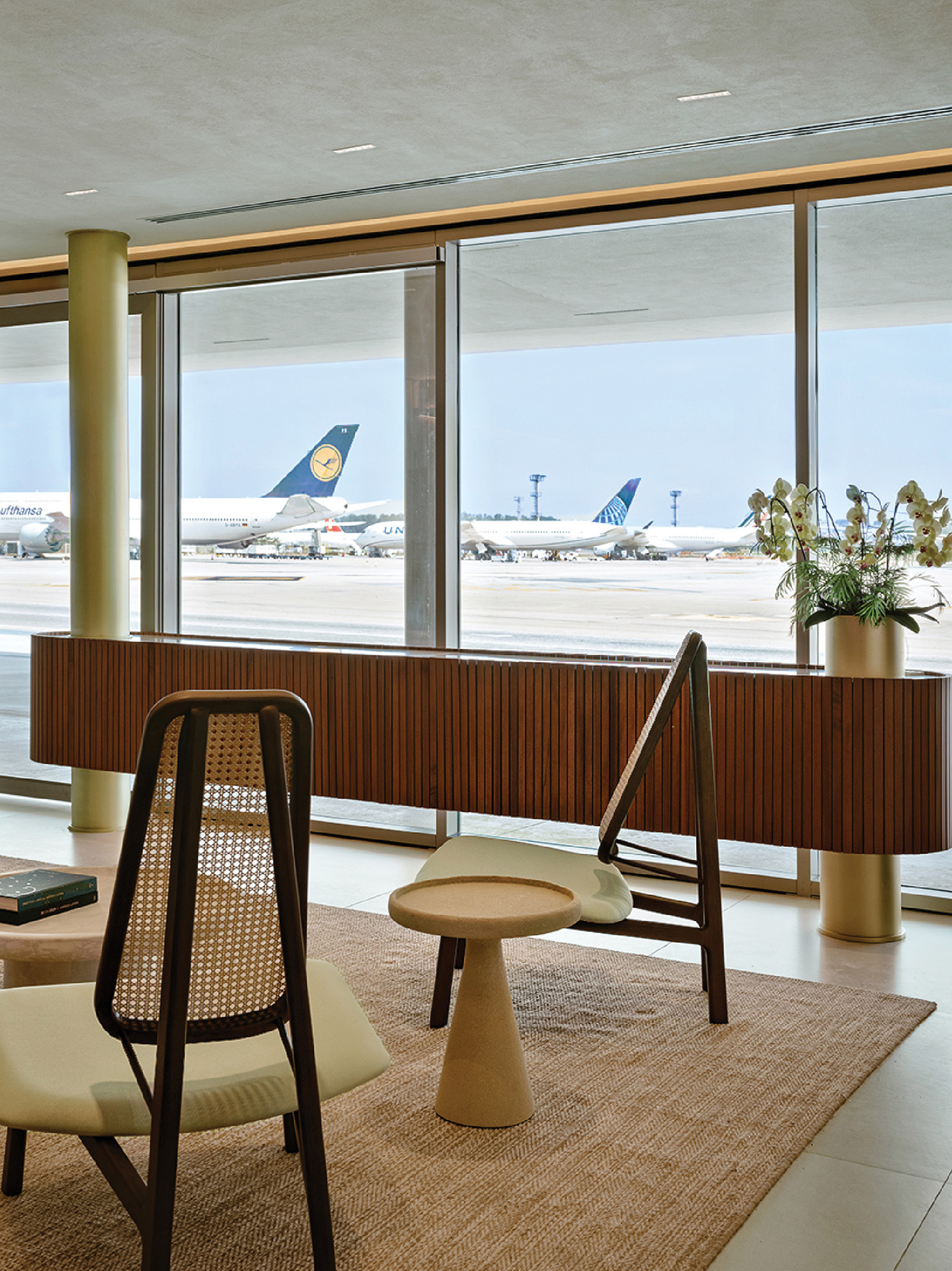 A large window with a view of an airport