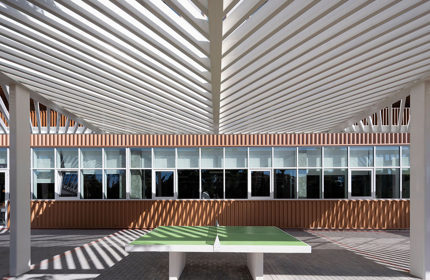 a ping po table in the courtyard of the new school