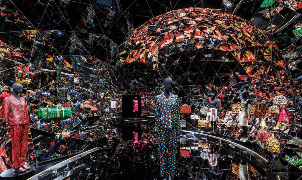 A large mirror ball with many different items.