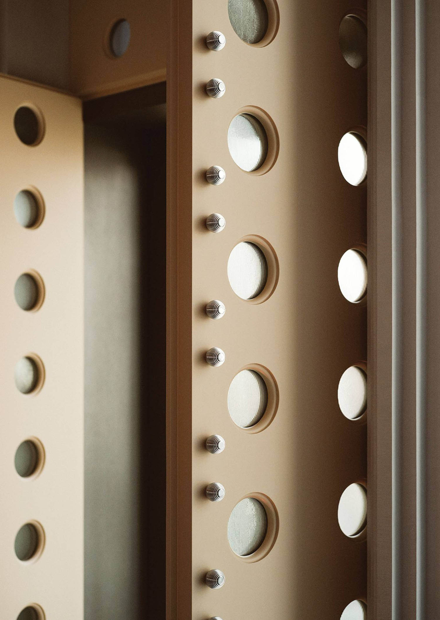 A mirror with several circles on it.