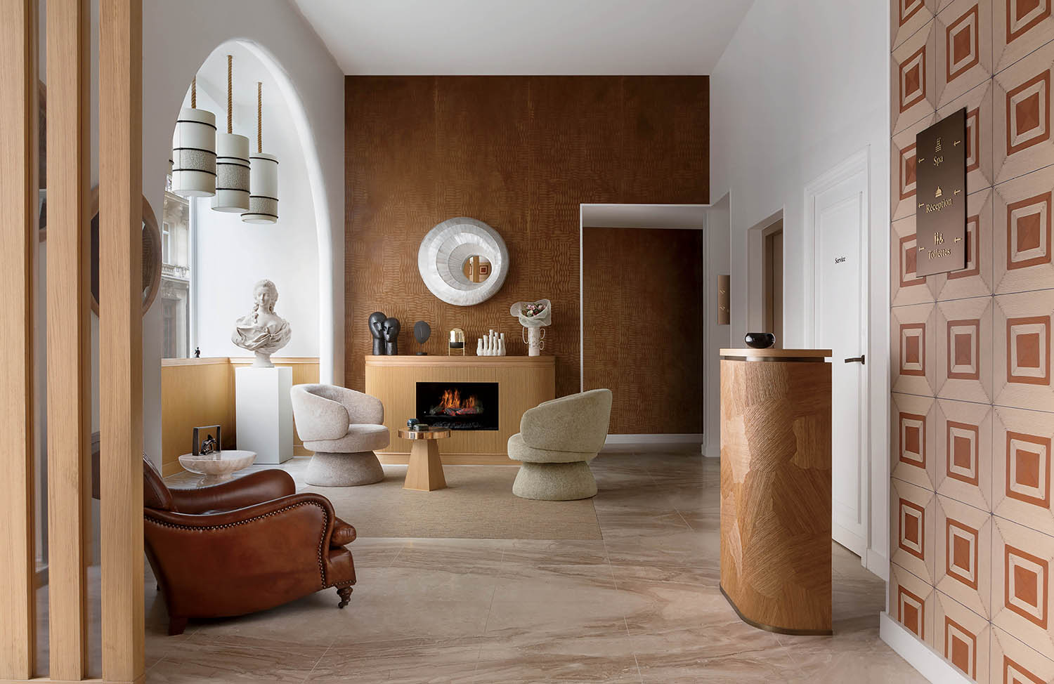 A living room with a fireplace and a chair.