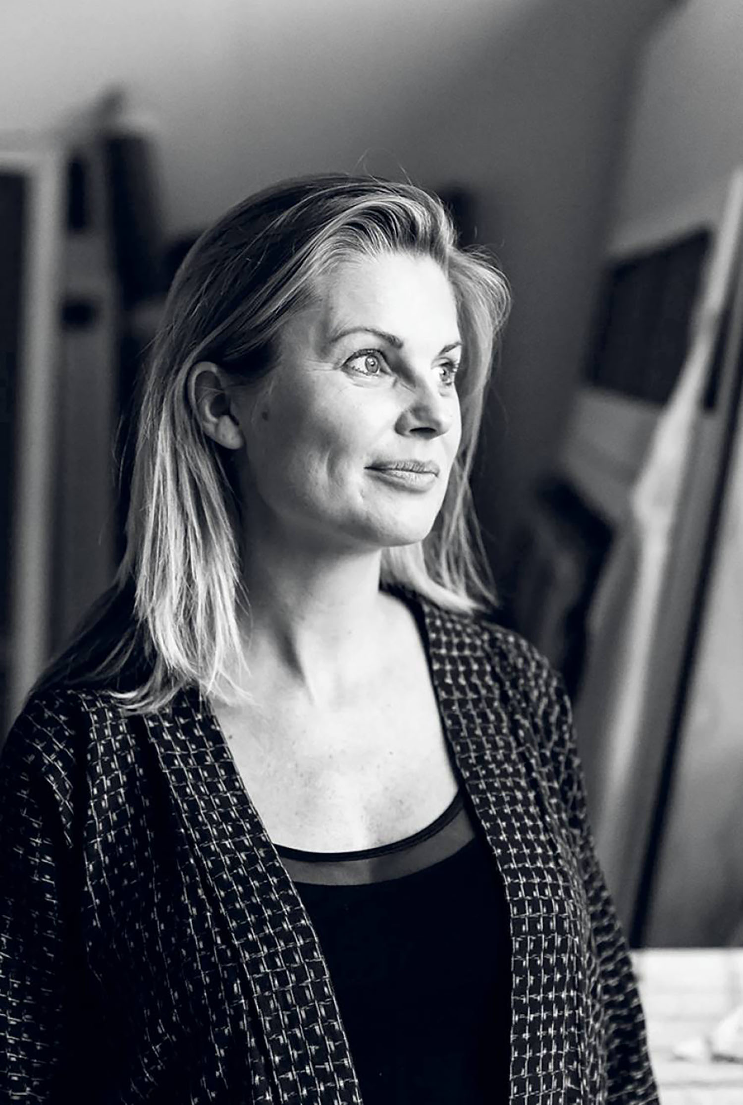 A woman in a black and white photo.