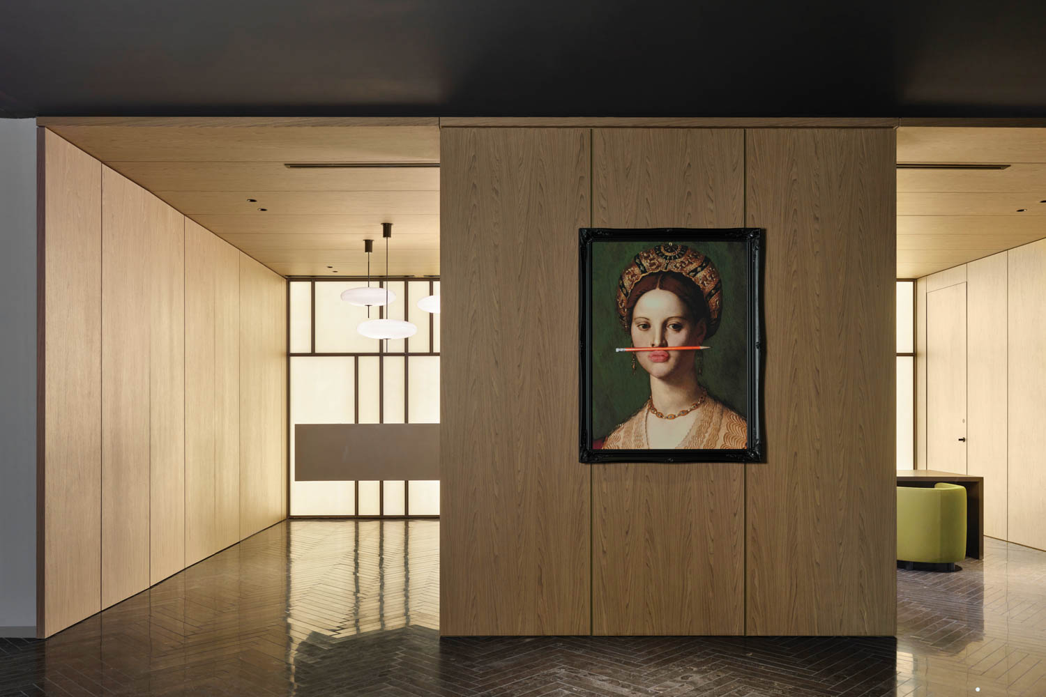 a quirky artwork of a historical woman with a pencil across her lips in the lobby of a Virginia hotel