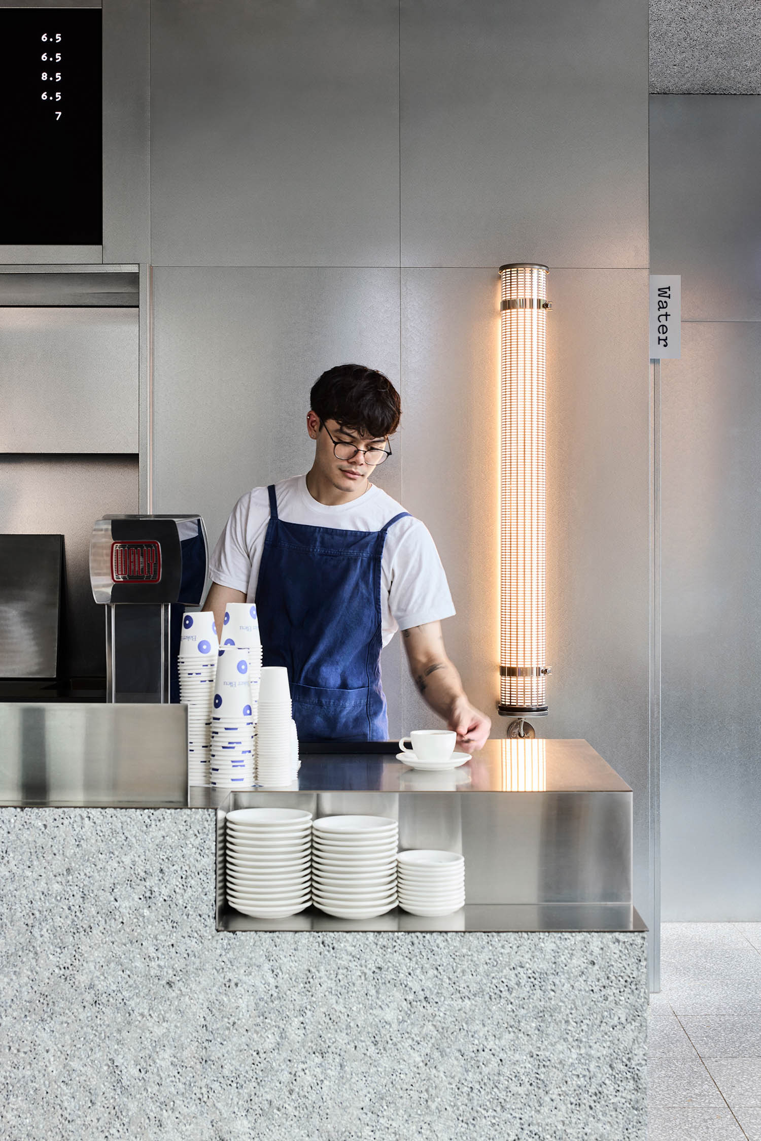 barista making coffee at Baker Bleu