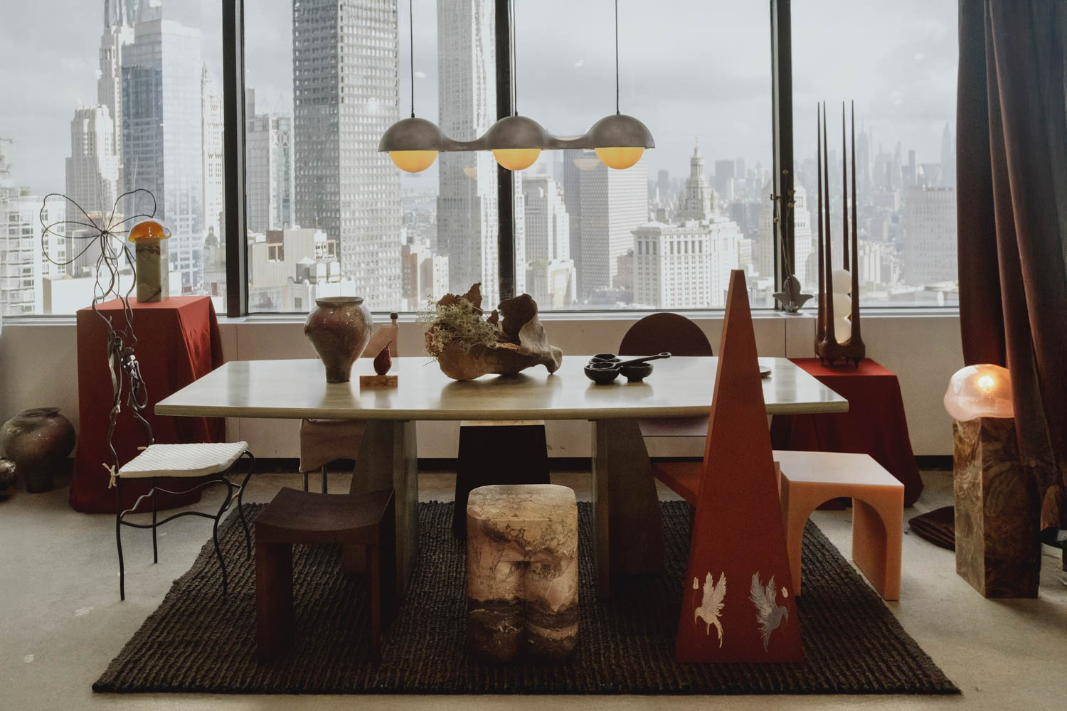 long table with multiple objects